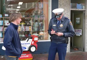 Ask It Participant getting a policman to fill out a suggestion card